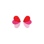 Charger l’image dans la galerie Boucles puces en cuir pailleté rose, bordeaux et rouge métallisé, forme de papillon stylisée.
